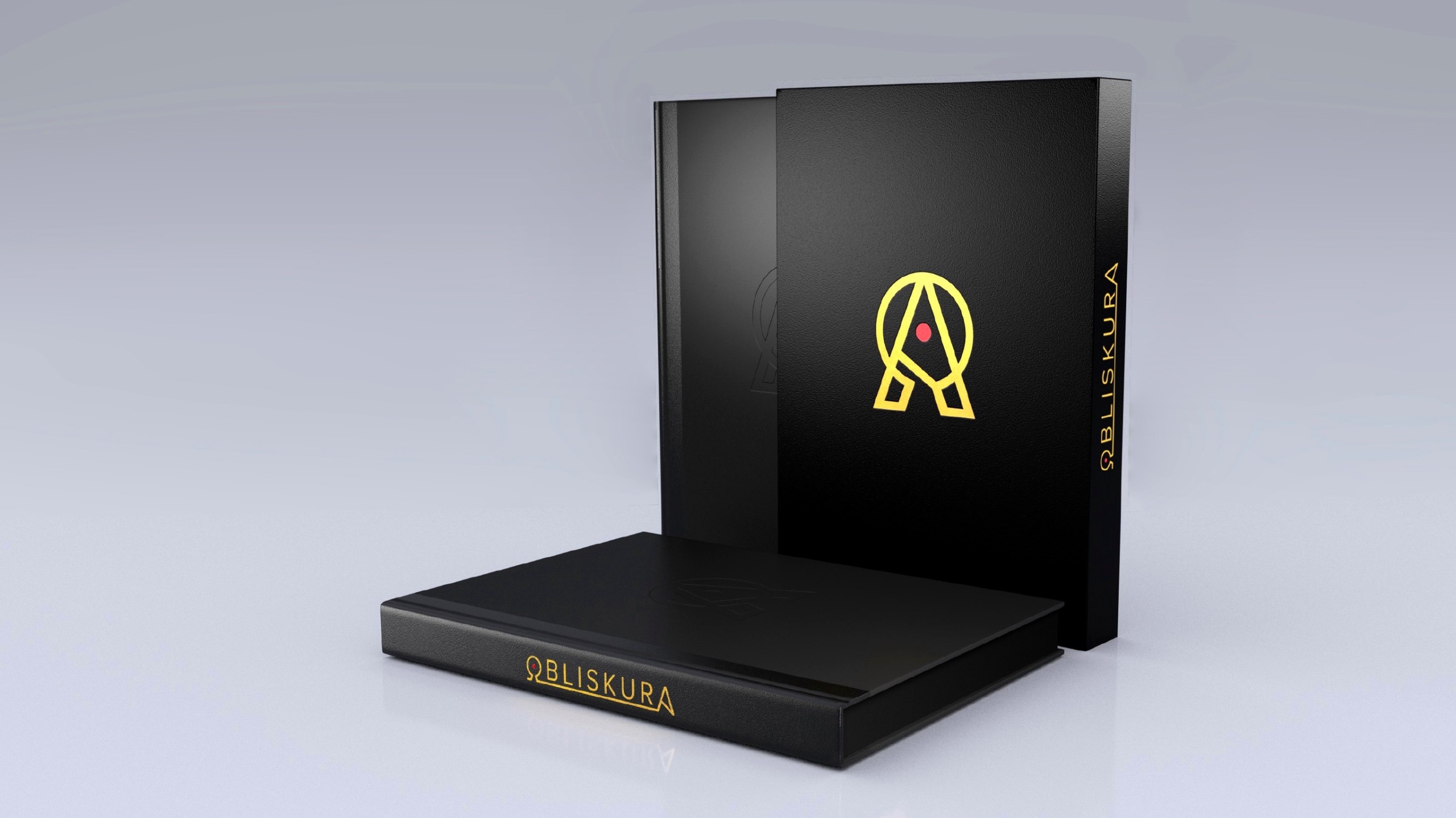 L'artbook obliskura d'Alex Konstad et son coffret noir doré.